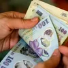 Salariul minim ar putea crește cu 6,8%. Proiect discutat joi în Guvern
