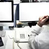 Grupare infracțională care activa în șase call center-uri, destructurată de DIICOT