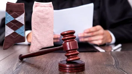 Român condamnat la închisoare după ce a furat două perechi de şosete. A spus că îi era frig